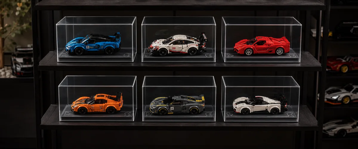 1,000 custom-fit acrylic LEGO Speed Champions display cases with silicone dust-seal across 5 set variants for a DTC collector brand