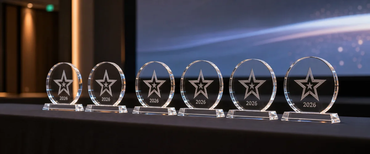 Row of engraved PMMA acrylic recognition awards under $20 each, prepared for an HR employee recognition program