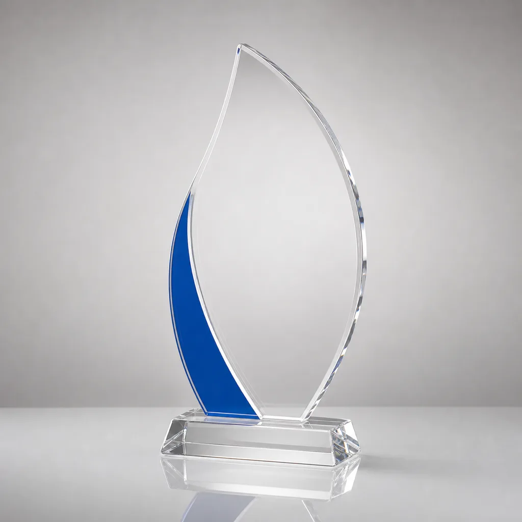 Freestanding flame-shaped acrylic trophy with an amber accent, diamond-polished edges, and a matte black base