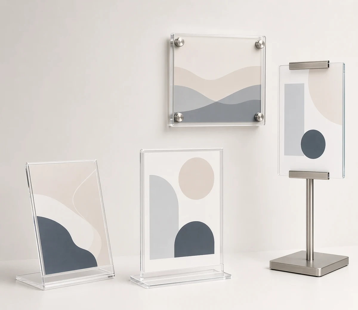 Collection of acrylic sign holders including slant-back, T-style, wall-mounted standoff, and floor-standing pedestal designs