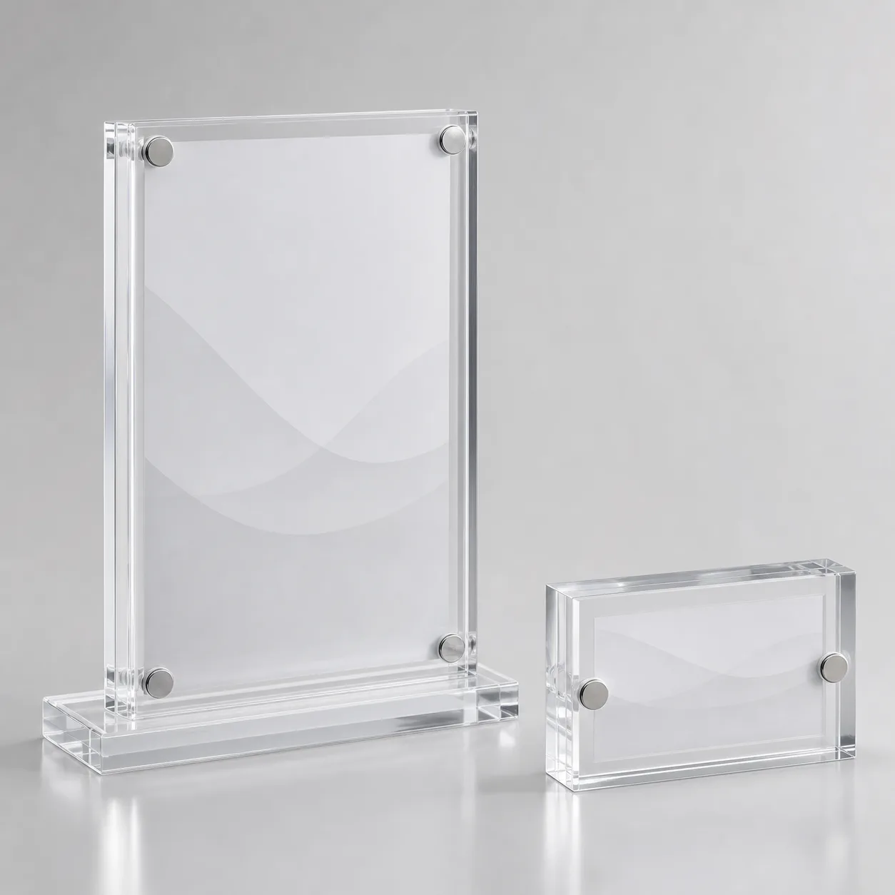 Double-sided acrylic magnetic frame on a slotted base showing a menu visible from both sides, beside a block magnetic name plate
