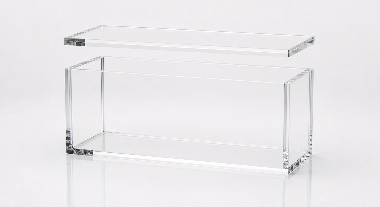 Photorealistic empty clear acrylic display case with a removable magnetic top lid and subtle visible flush magnets